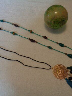 TWO BEAUTIFUL BOHEMIAN NECKLACES 1 LONG W COLORED BEADS & 1 LONG W DISC TASSELS